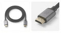 Câble HDMI haute vitesse avec gaine tressée noire en fibre de Kevlar et connecteurs métalliques gris marqués 4K HDMI.