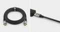 Câble HDMI haute vitesse noir tressé en fibre de Kevlar avec connecteurs métalliques gris et or, durable et résistant.