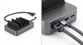 Station de charge multi-ports compacte gris anthracite en aluminium avec finition tressée Kevlar et câbles noirs robustes.