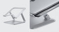 Support ergonomique pour ordinateur portable en aluminium argenté avec patins antidérapants et design ajustable pour confort et stabilité.